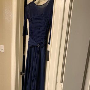 Tea-length chiffon navy dress with pleated bodice.
